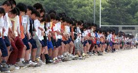 Nagoya students break world record for '3-legged race'